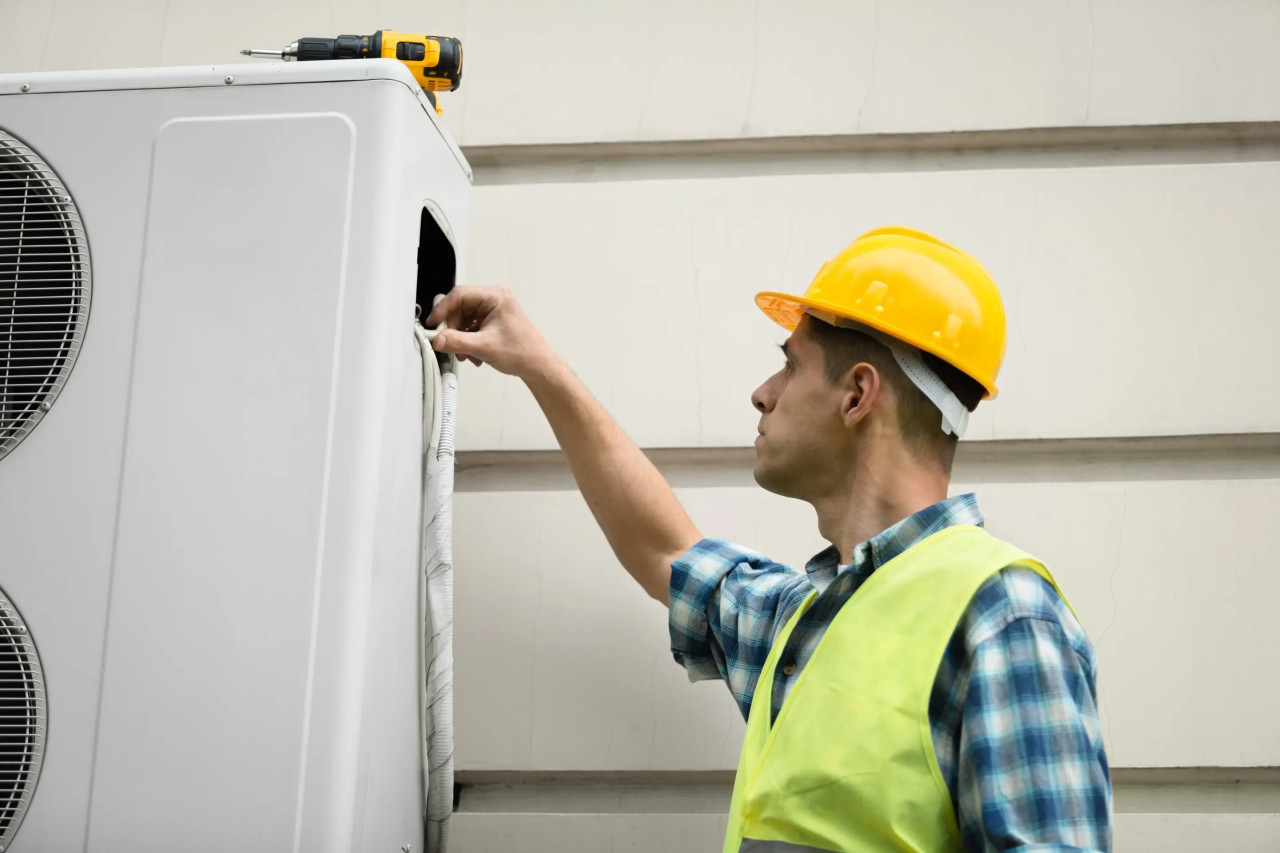 technician-inspecting-walk-in-cooler