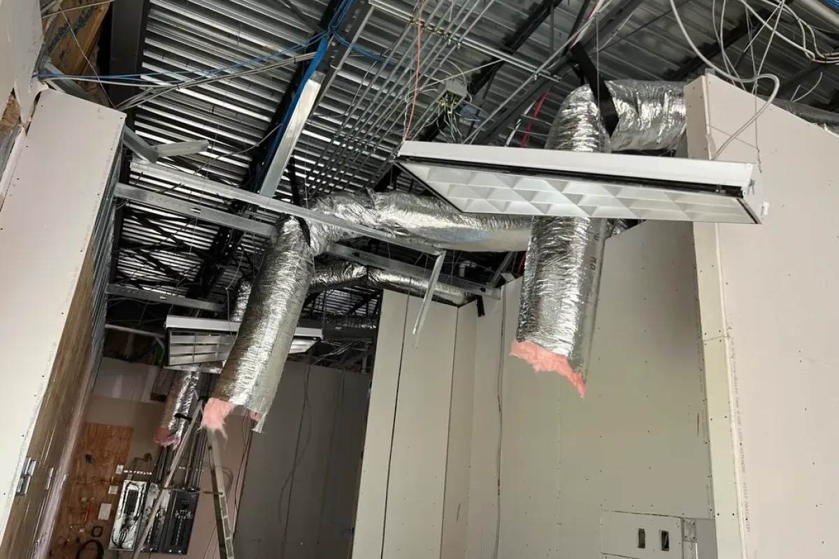 Industrial cooling system ductwork installation, part of commercial Hilton Head HVAC services.
