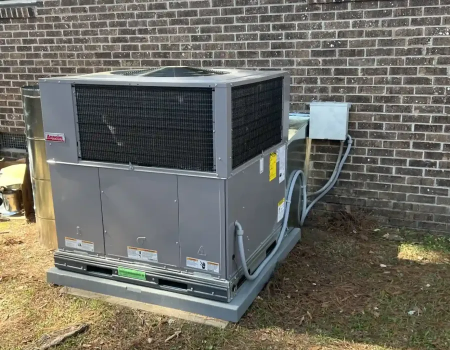 Large Carrier heating and cooling system installed outdoors for efficient climate control.