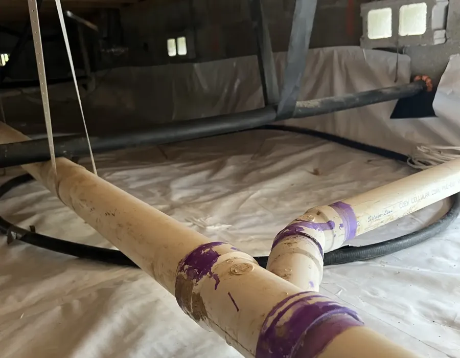 Clean encapsulated crawl space with moisture barrier installation