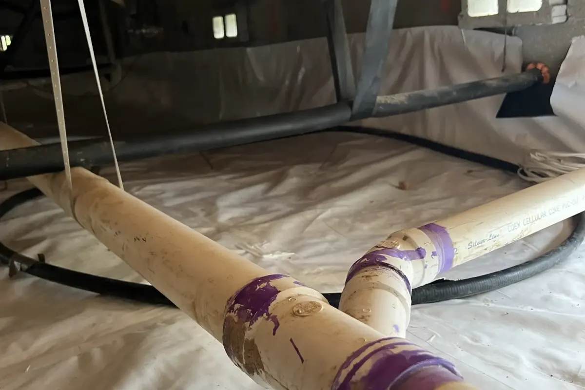 Clean encapsulated crawl space with moisture barrier installation